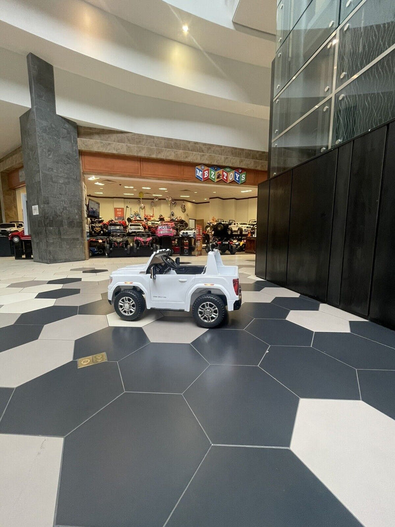 24V Interactive TV GMC Ride On Electric Toy 4x4 with Leather Seating and Advanced Rubber EVA Tires - Remote Control