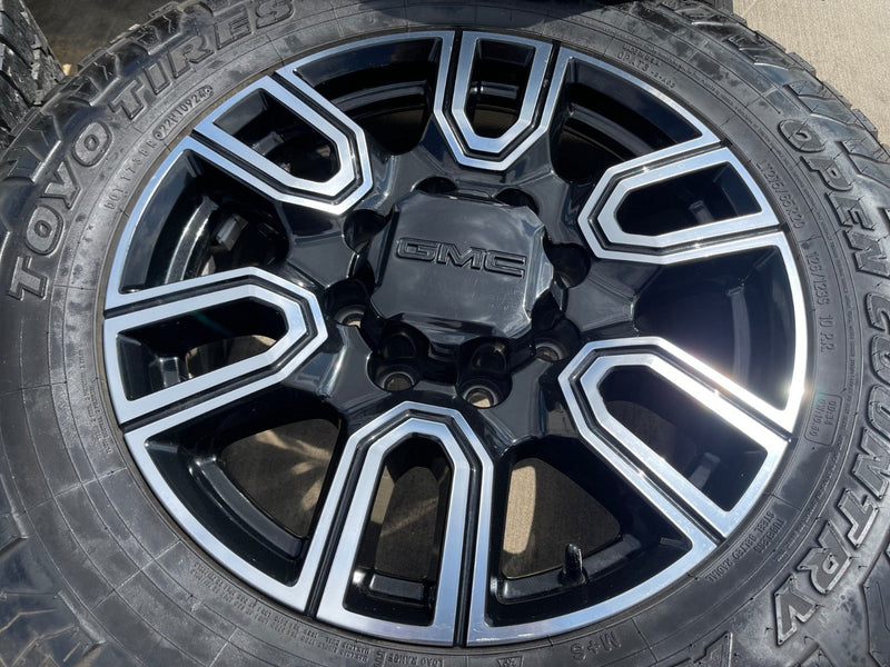 20" GMC Sierra AT4 2500 3500 OEM wheels rims 5950 Silverado tires TOYO A/T3 Texas Truck Tire