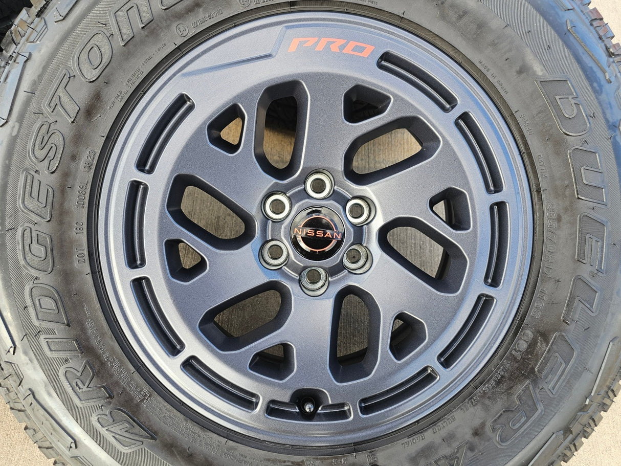 17" Nissan Frontier X-PRO OEM Desert Runner wheels rims tires DUELER A/T Texas Truck Tire
