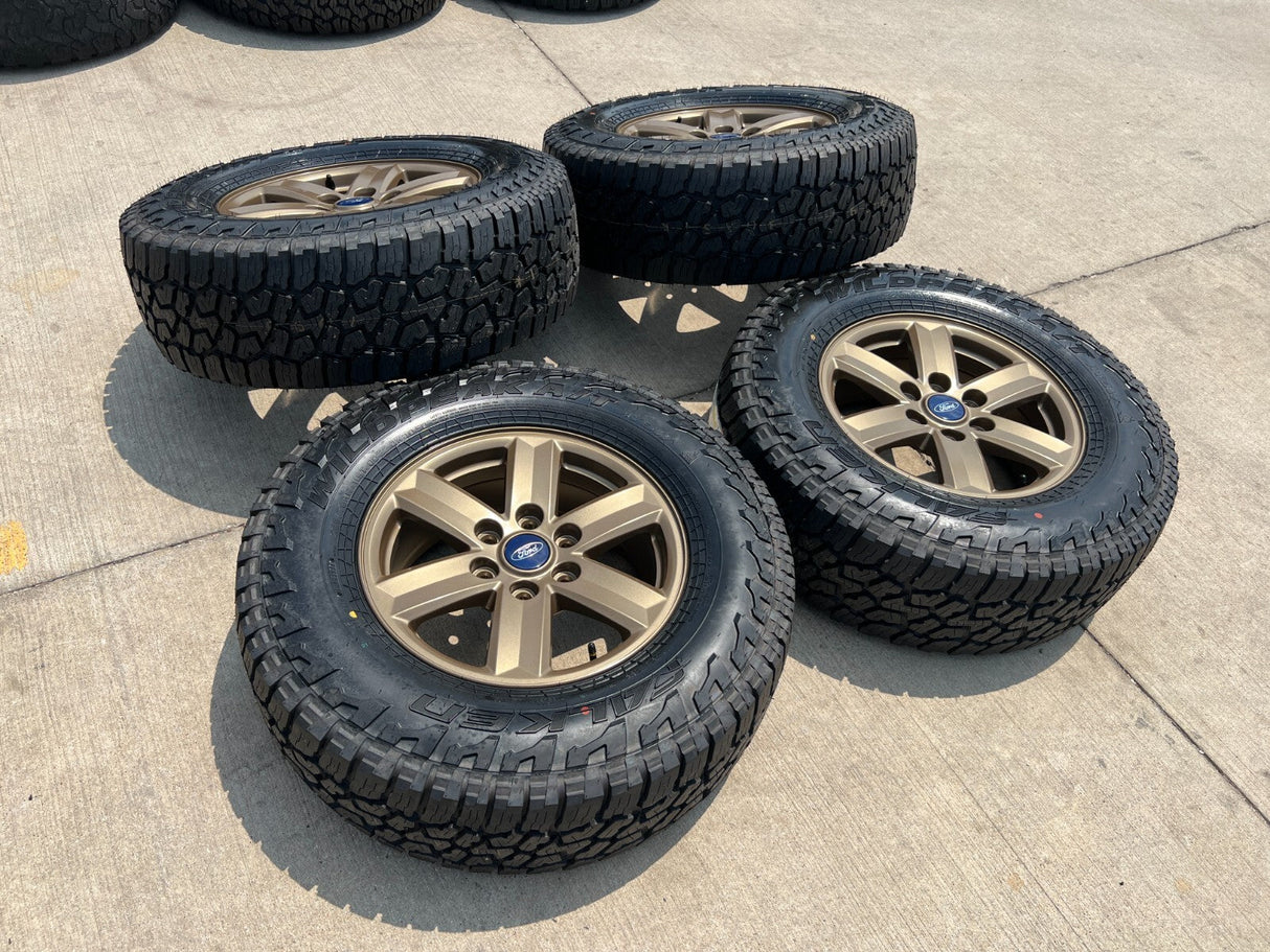 17" Ford F-150 OEM BRONZE Tremor rims wheels tires 10339 FALKEN A/T3 NEW Texas Truck Tire