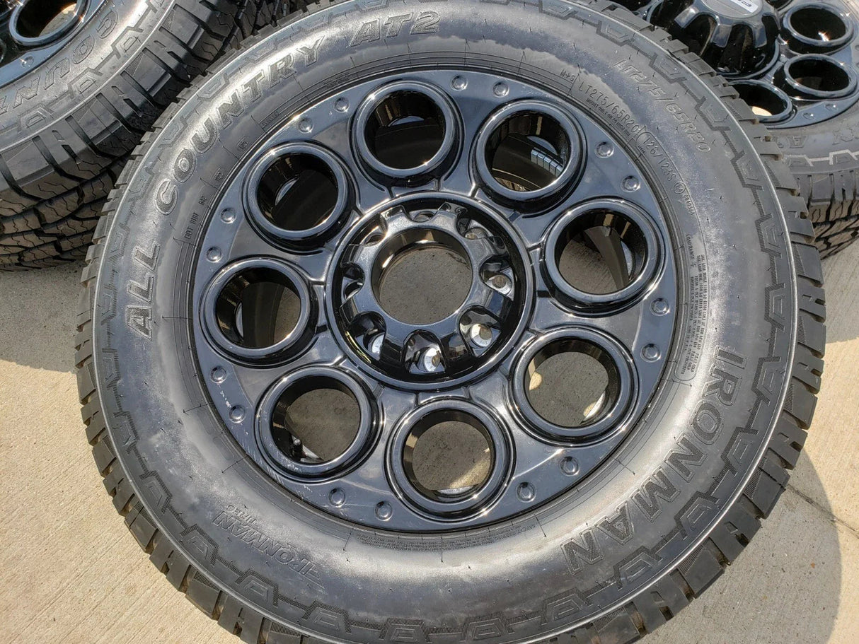 20" Ford F-250 F-350 OEM black TREMOR wheels rims 10299 10484 A/T2 tires NEW Texas Truck Tire