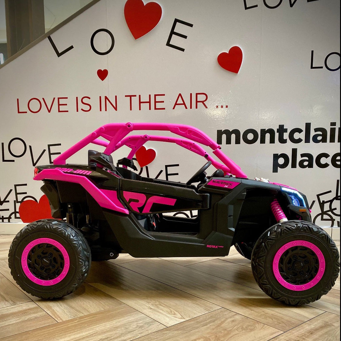 48V XL Can-Am Maverick Remote Control 4WD Ride-On UTV Toy in Pink