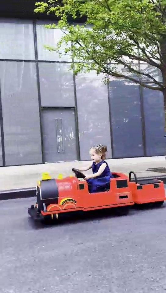 Kids Ride-On Train for Backyard Fun – Battery Powered W/Magic Cars® Remote Control, Real Steam Stack, MP3 & Working Caboose (Ages 1–10)