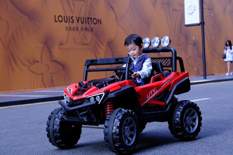 Kids 12V Ride-On Car with Remote Control, iPhone App Connectivity, and LED Lights