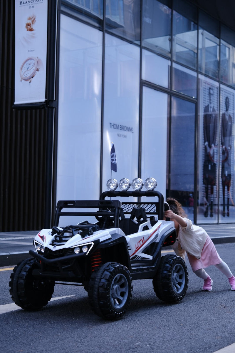 Kids 12V Ride-On Car with Remote Control, iPhone App Connectivity, and LED Lights