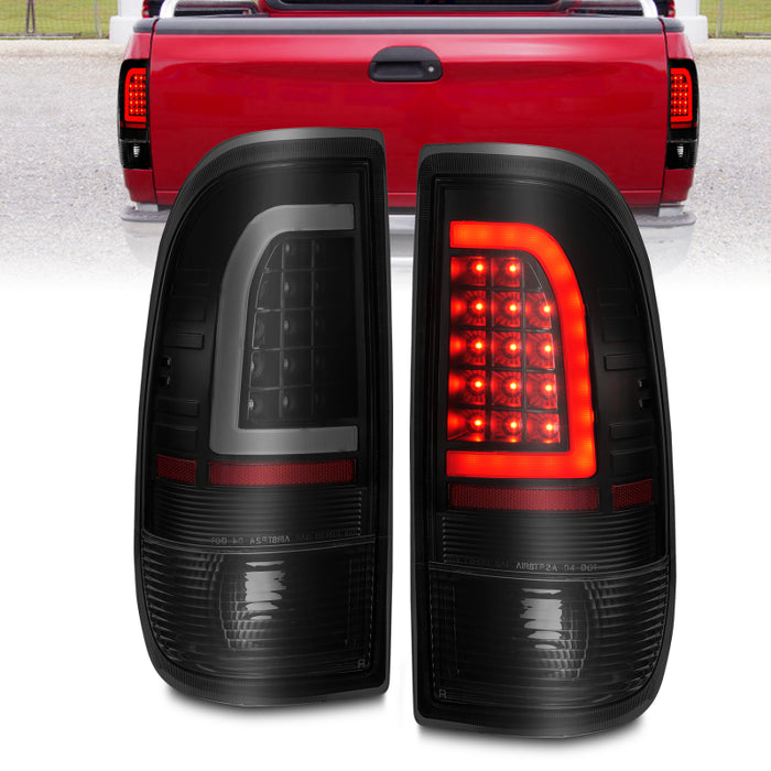 Feux arrière à LED ANZO 1997-2003 Ford F-150 avec barre lumineuse, boîtier noir, lentille fumée