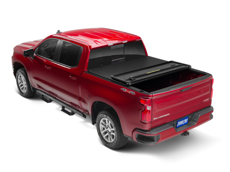 Tonno Pro 04-15 Nissan Titan (avec kit de serrage pour système de chenilles) Couvre-caisse rigide pliable de 6 pi 7 po