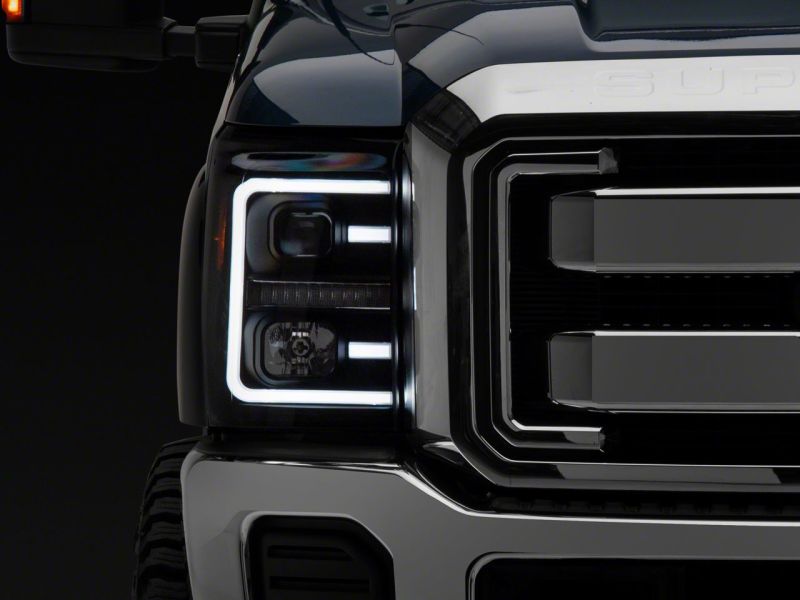 Phares de projecteur à LED Raxiom 11-16 Ford F-250 Super Duty - Boîtier noir (lentille transparente)