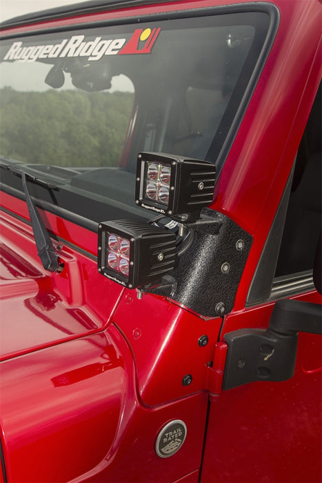 Support d'éclairage double pour montant A noir texturé Rugged Ridge 97-06 Jeep Wrangler TJ