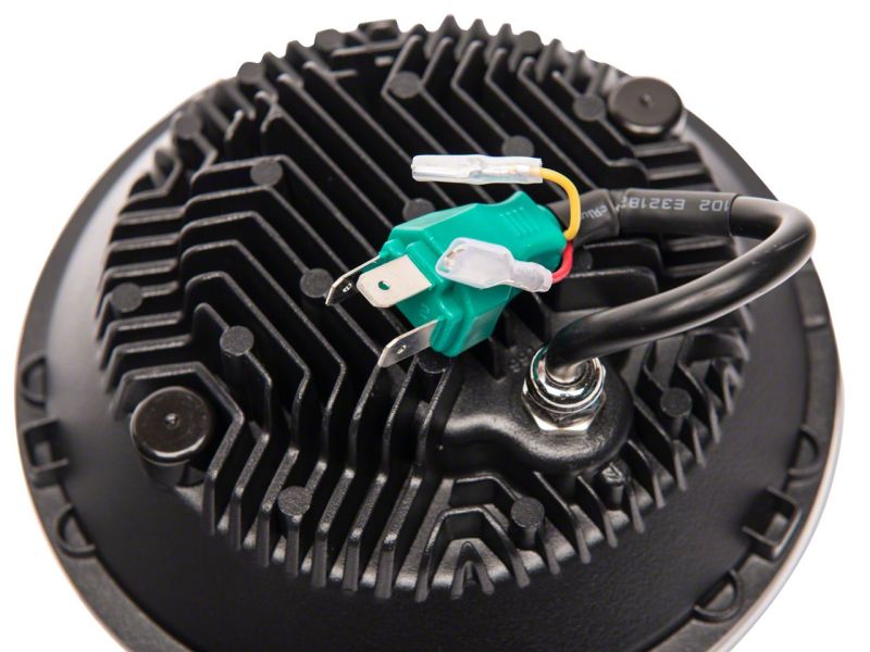 Phares à DEL Raxiom 07-18 Jeep Wrangler JK Axial 7 pouces avec clignotants DRL - Boîtier noir (transparent)