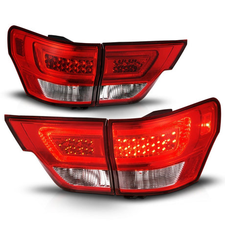 Feux arrière à LED ANZO 11-13 Jeep Grand Cherokee avec barre lumineuse Boîtier chromé Lentille rouge/transparente 4 pièces