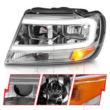 Phares en cristal ANZO 1999-2004 Jeep Grand Cherokee avec barre lumineuse et boîtier chromé