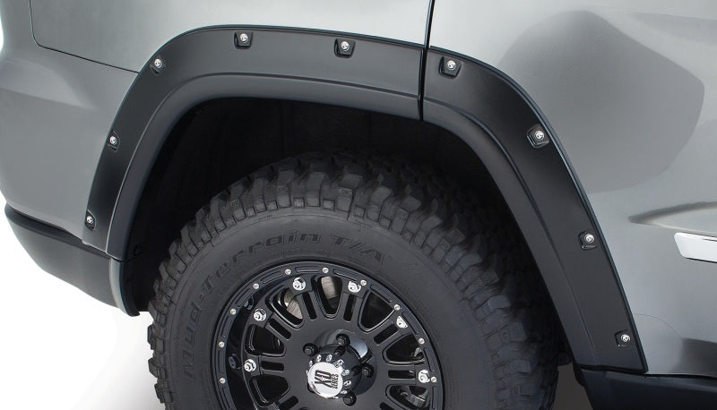 Élargisseurs de poche Bushwacker 11-18 Jeep Grand Cherokee 2 pièces Ne convient pas au SRT8 - Noir