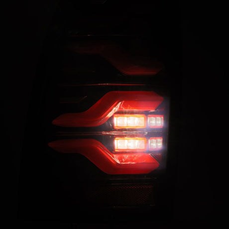 Feux arrière à LED AlphaRex 05-15 Toyota Tacoma LUXX noir/rouge avec lumière active/signal séquentiel