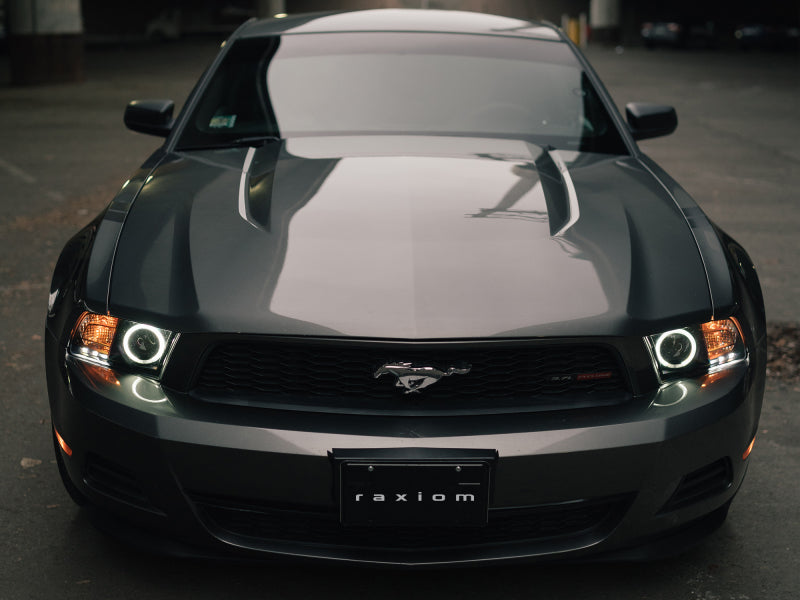 Raxiom 10-12 Ford Mustang avec phares CCFL Halo Projector Headlights - Boîtier noir (lentille transparente)