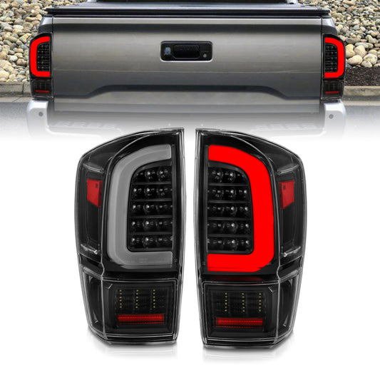 ANZO 16-21 Toyota Tacoma LED Tail Lights - w/ Light Bar Sequential Black Housing & Clear Lens