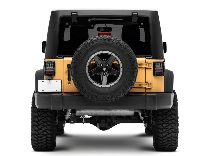 Feux arrière à LED Raxiom 07-18 Jeep Wrangler JK Axial Series Lux - Boîtier noir (lentille transparente)