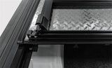 Couvercle à trois volets en uréthane noir Access LOMAX pour caisse Ram 2500/3500 19+ de 6 pi 4 po (avec système de gestion de chargement RamBox)