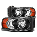 Phares en cristal Raxiom 02-05 Dodge RAM 1500 - Boîtier noir (lentille transparente)