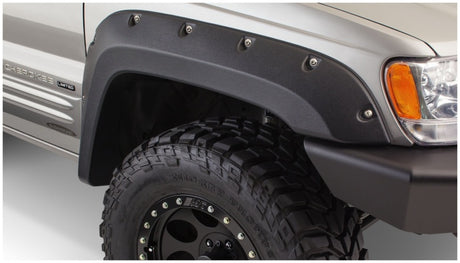 Élargisseurs de style découpé Bushwacker 99-04 Jeep Grand Cherokee 4 pièces - Noir