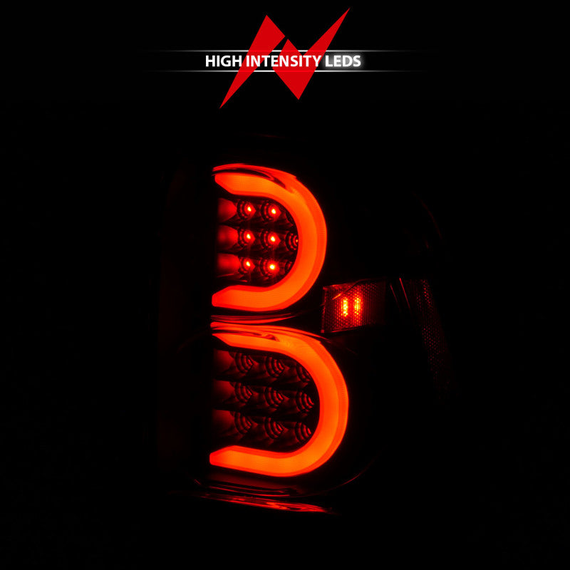 Feux arrière à LED ANZO 2002-2009 Chevrolet Trailblazer avec barre lumineuse, boîtier noir, lentille transparente