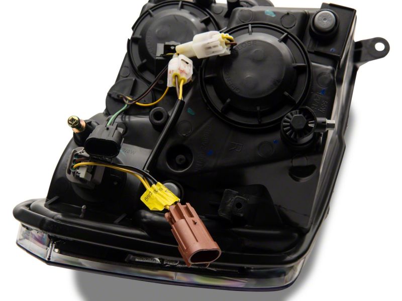 Phares axiaux Raxiom 09-18 Dodge RAM 1500/2500/3500 avec barre LED SEQL - Boîtier noir (lentille transparente)