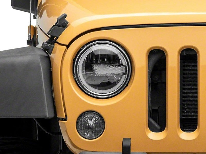 Phares à LED Raxiom 97-18 Jeep Wrangler TJ/JK 7 pouces avec halos - Boîtier noir (lentille transparente)