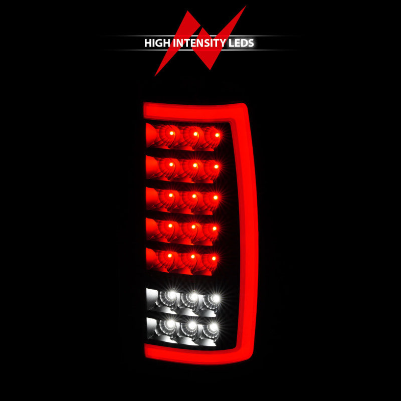 Feux arrière à LED ANZO 00-06 Chevrolet Tahoe / GMC Yukon avec barre lumineuse, boîtier noir/lentille transparente