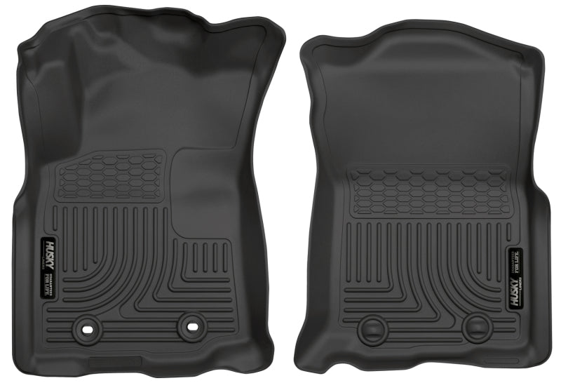 Revêtements de sol avant noirs Husky Liners 2016 Toyota Tacoma avec transmission manuelle WeatherBeater