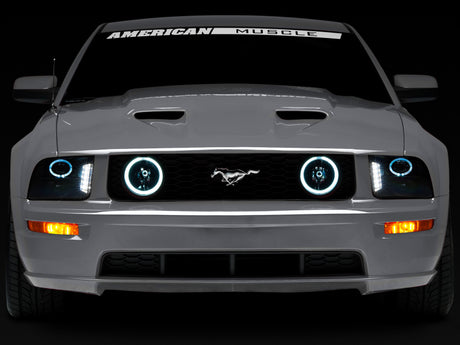 Phares avant à DEL halogènes Raxiom 05-09 Ford Mustang avec projecteurs halogènes - Hsng noir (lentilles fumées excluant GT500)