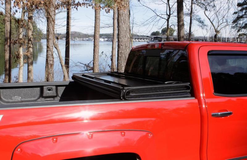 Lund 05-17 Nissan Frontier Styleside (6ft. Bed) Hard Fold Tonneau Cover - Black