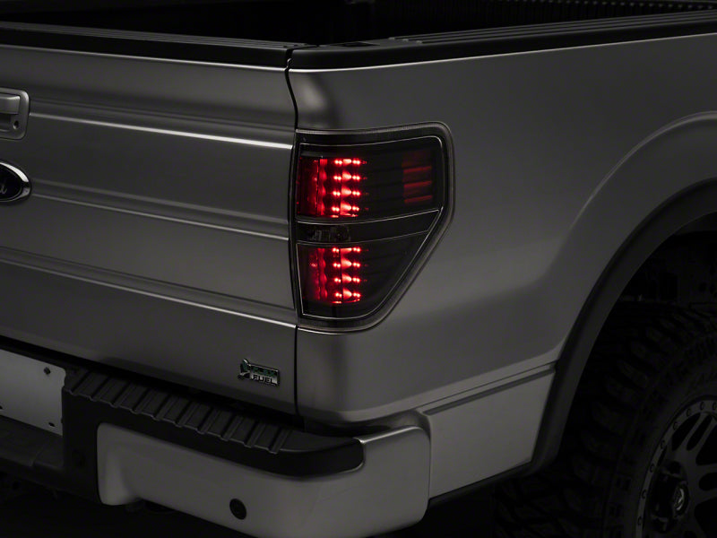 Feux arrière à LED Raxiom 09-14 Ford F-150 Styleside - Boîtier noir (lentille transparente)