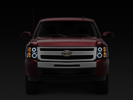Raxiom 07-13 Silverado 1500 Super White LED Halo Projector Headlights- Black Housing (Clear Lens)