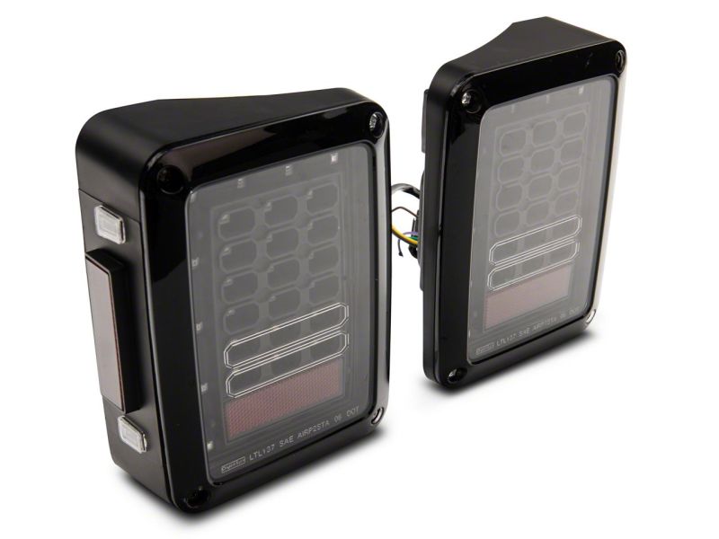 Feux arrière à LED Raxiom 07-18 Jeep Wrangler JK Axial Series - Boîtier noir (lentille transparente)