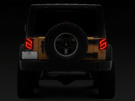 Feux arrière à LED Raxiom 07-18 Jeep Wrangler JK Axial Series Trident - Boîtier noir (lentille transparente)