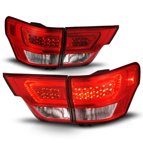 Feux arrière à LED ANZO 11-13 Jeep Grand Cherokee avec barre lumineuse Boîtier chromé Lentille rouge/transparente 4 pièces