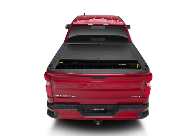 Roll-N-Lock 07-13 Chevy Silverado/Sierra avec capuchons de rail d'origine LB 96-1/4 po Cargo Manager