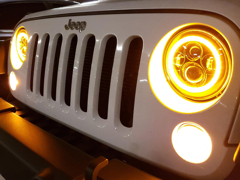 Phares axiaux à halo Raxiom 97-18 Jeep Wrangler TJ/JK avec signaux ambrés DRL - Blk Hsng (lentille transparente)