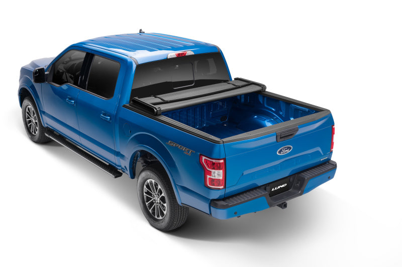 Lund 04-15 Nissan Titan (6.5ft. Bed w/o Utility TRack) Genesis Elite Tri-Fold Tonneau Cover - Black