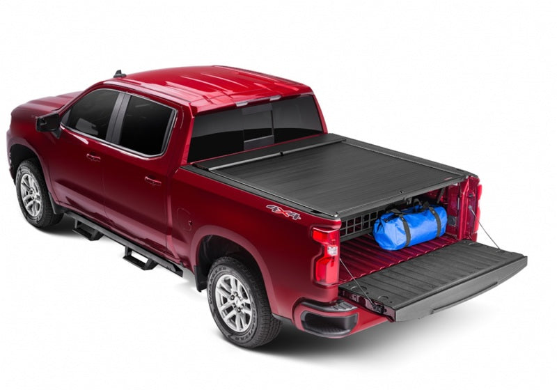 Roll-N-Lock 07-13 Chevy Silverado/Sierra avec capuchons de rail d'origine LB 96-1/4 po Cargo Manager