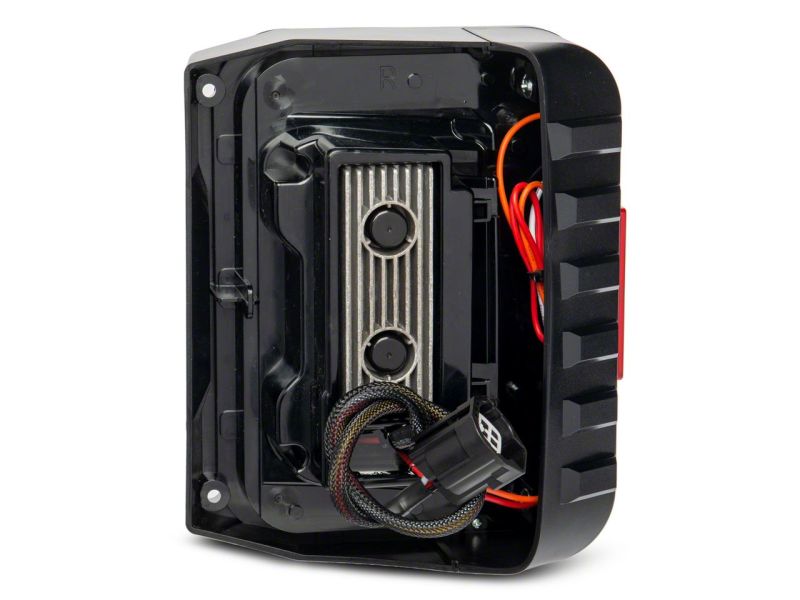 Feux arrière à LED Raxiom 07-18 Jeep Wrangler JK Axial Series Trident - Boîtier noir (lentille fumée)