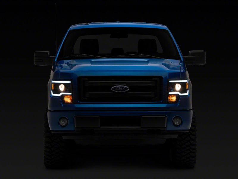 Phares de projecteur Raxiom 09-14 Ford F-150 Axial Series avec barre lumineuse à LED - Boîtier noir (lentille transparente)