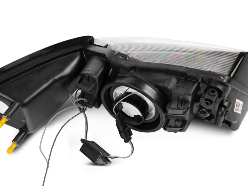 Phares Raxiom 99-04 Ford Mustang Axial Series avec barre LED - Boîtier noir (lentille transparente)