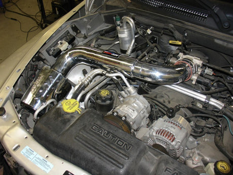Injen 00-04 Dakota 4,7 L V8 (sans régulateur de vitesse) Power-Flow (avec bouclier thermique en tôle diamantée) Rides