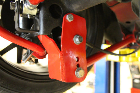 Supports de relocalisation du bras de suspension arrière UMI Performance 05-14 Ford Mustang - Boulonnés