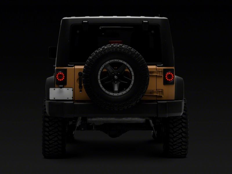 Feux arrière à LED Raxiom 07-18 Jeep Wrangler JK Axial Series Halo - Boîtier noir (lentille transparente)