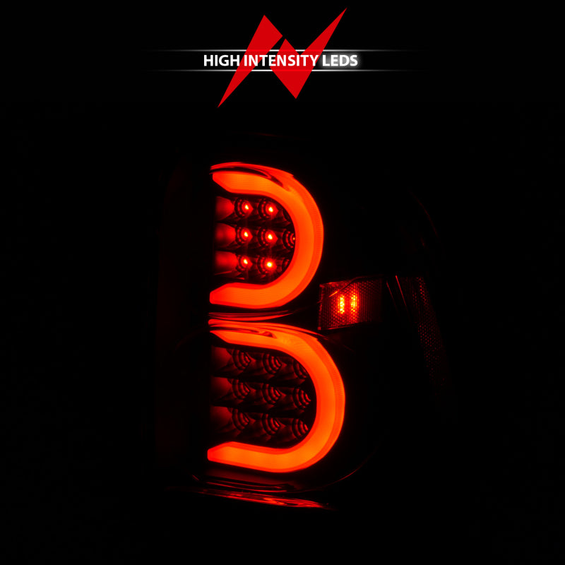 Feux arrière à LED ANZO 2002-2009 Chevrolet Trailblazer avec barre lumineuse, boîtier noir, lentille fumée