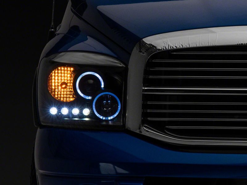 Phares de projecteur à LED Raxiom 06-08 Dodge RAM 1500 - Boîtier noir (lentille transparente)