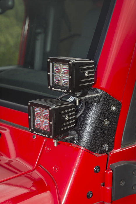 Support d'éclairage double pour montant A noir texturé Rugged Ridge 97-06 Jeep Wrangler TJ