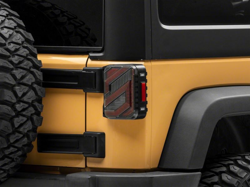 Feux arrière à LED Raxiom 07-18 Jeep Wrangler JK Axial Series Trident - Boîtier noir (lentille transparente)